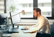 Smiling man at desk