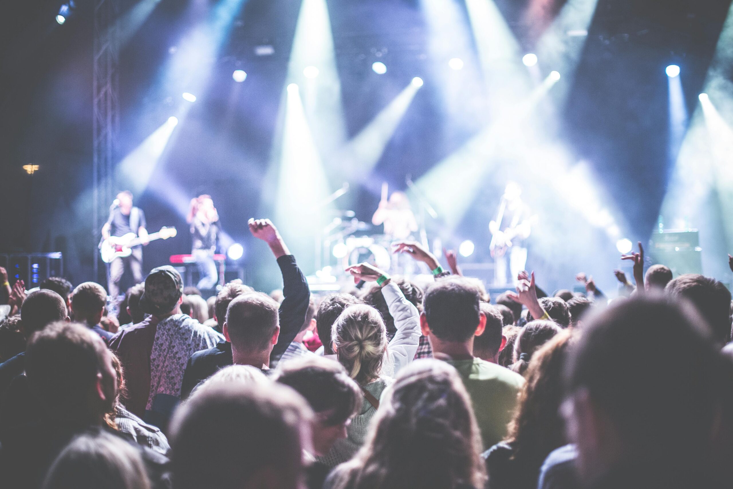 Live concert event photography with crowd and stage lights
