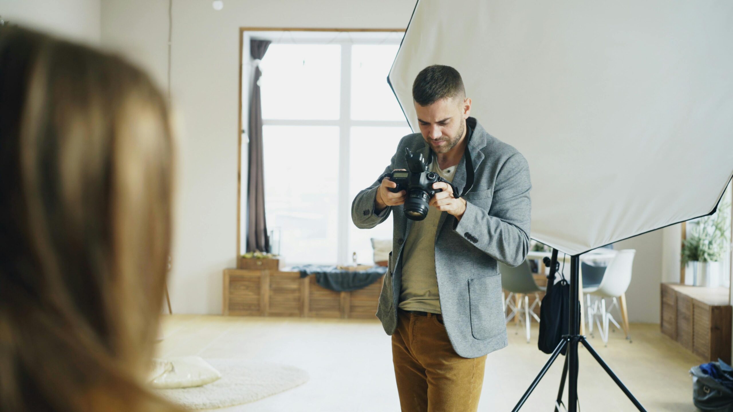 Professional photographer working in a studio setting